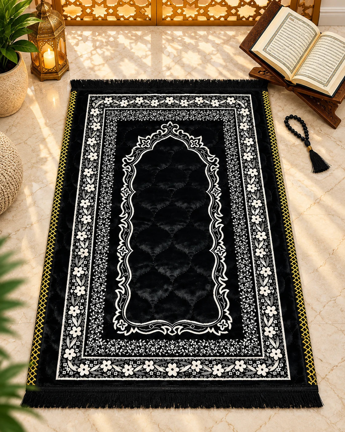 Shab-e-Noor premium black Janamaz with white floral borders, ornate Mehrab design, golden side accents, and black fringes by House of Wriya.