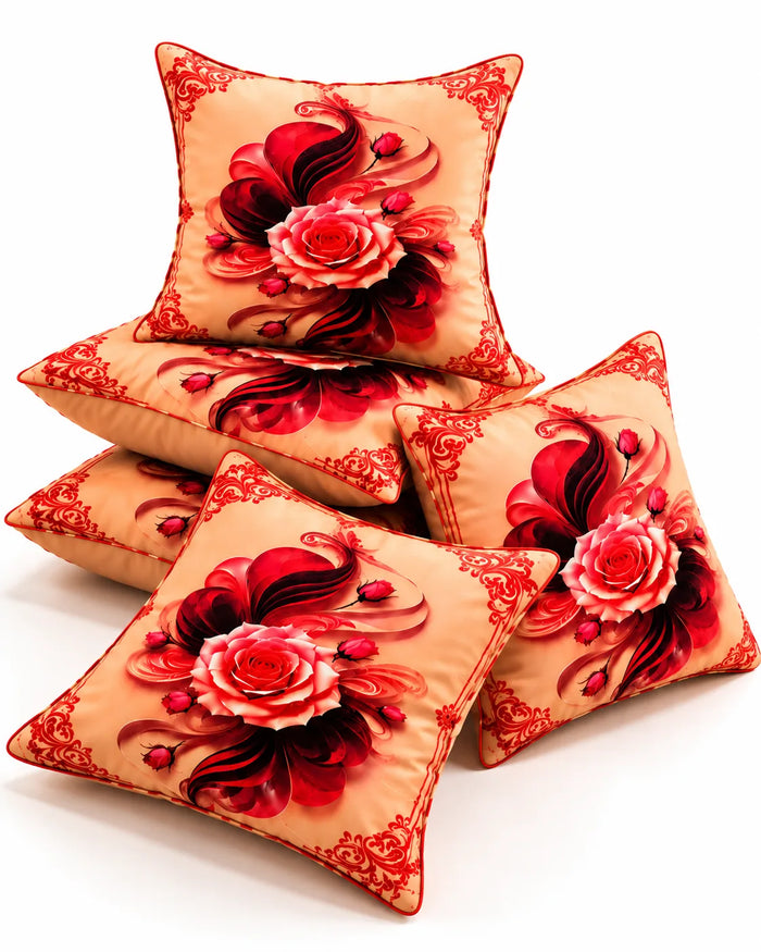 Peach cushion covers featuring large red and black rose designs with decorative red ornamental borders.