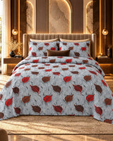 Red and brown leaf floral bedsheet on a luxury bed by House of Wriya