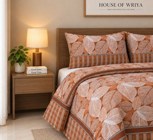 Brown leaf print bedsheet set with botanical design and matching pillow covers