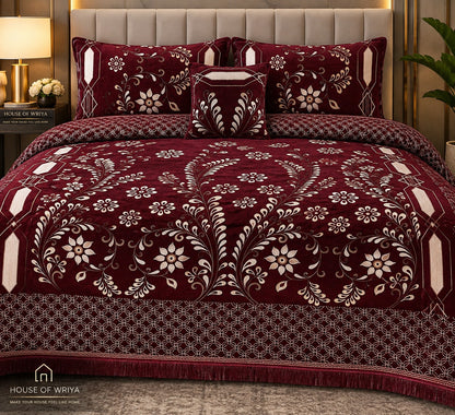 Burgundy floral print bedsheet set with elegant botanical design styled on a luxury bedroom