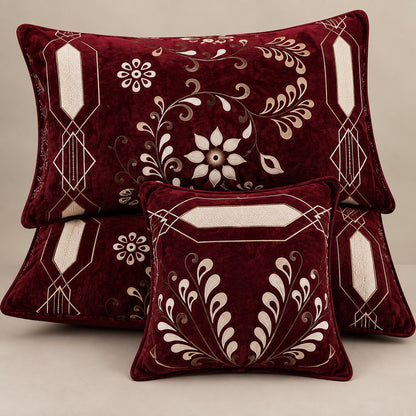 Burgundy velvet cushion covers set with elegant floral botanical design styled for a luxury bedroom
