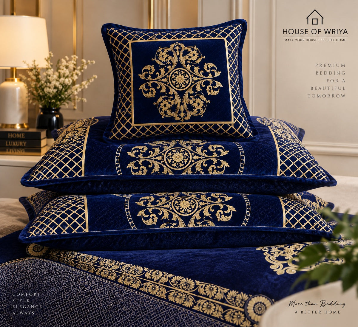 Navy blue velvet bedsheet set with gold embroidery and matching decorative cushion covers on a luxury bed