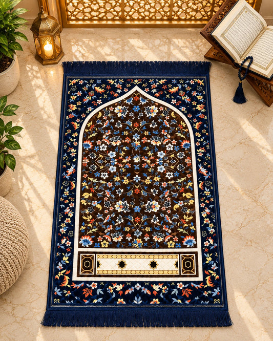 Neelam-e-Gul navy blue Janamaz with colourful floral Mehrab design, cream decorative panel, and matching fringes by House of Wriya.